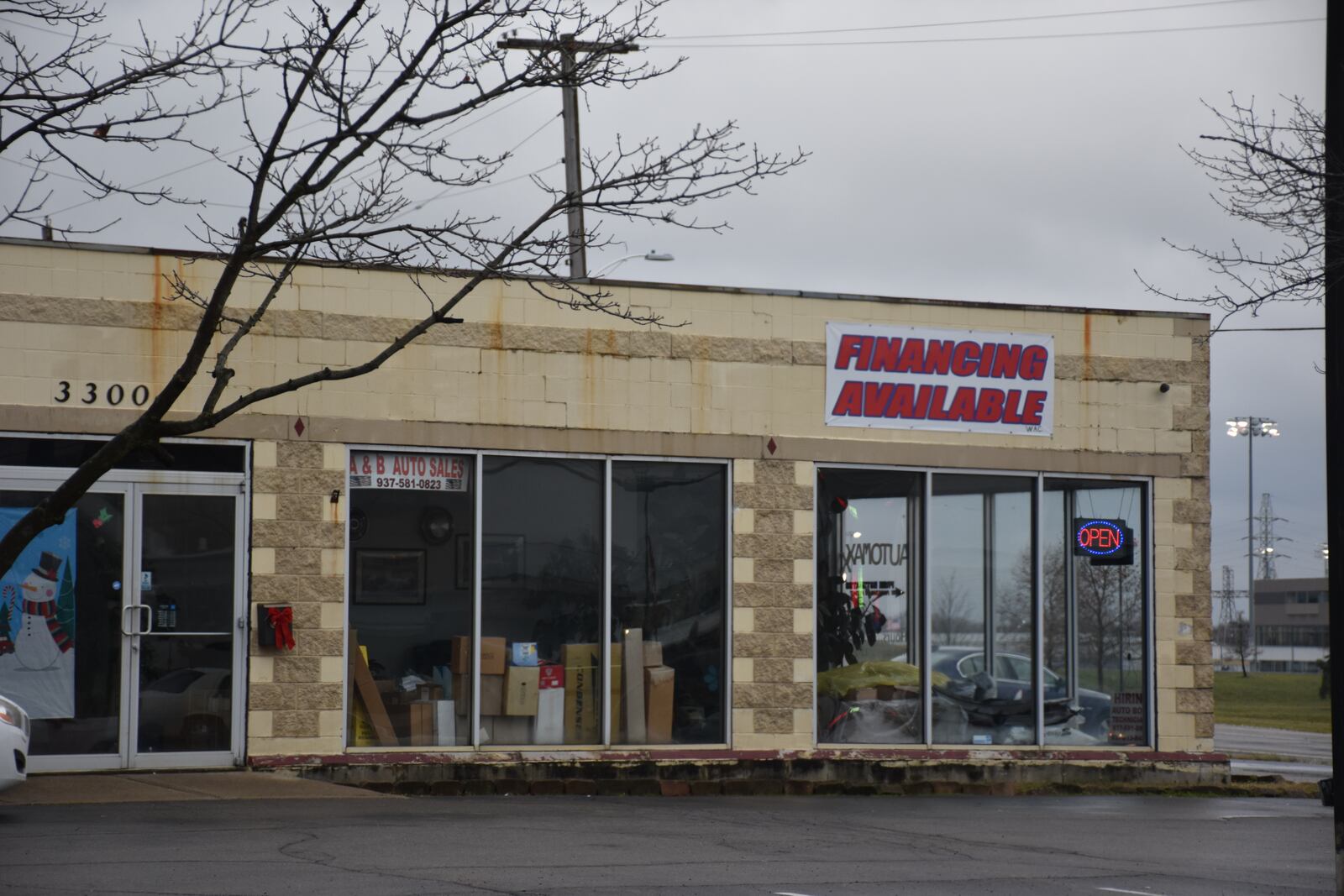 A developer proposes to convert this auto shop on Needmore Road in Dayton into a new marijuana dispensary with a drive-thru window. CORNELIUS FROLIK / STAFF