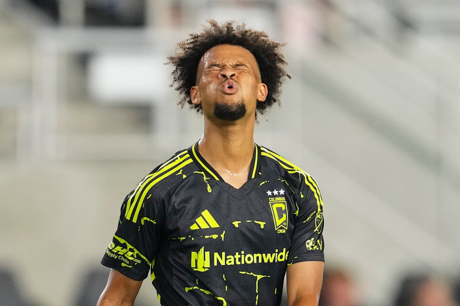 Columbus Crew forward Jacen Russell-Rowe reacts after a missed shot on goal during the second half of an MLS soccer match against the Vancouver Whitecaps, Saturday, June 14, 2025, in Columbus, Ohio. (AP Photo/Jeff Dean)