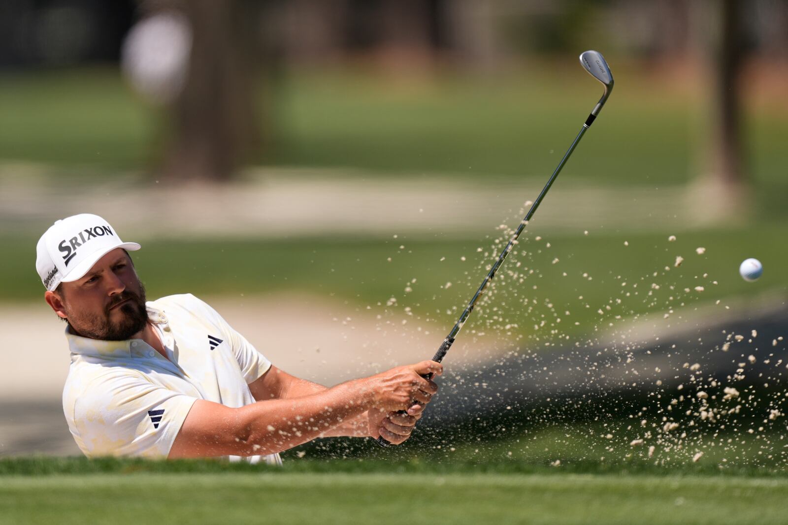 Andrew Novak hits from the second hole during the third round of the RBC Heritage golf tournament, Saturday, April 19, 2025, in Hilton Head Island, S.C. (AP Photo/Mike Stewart)