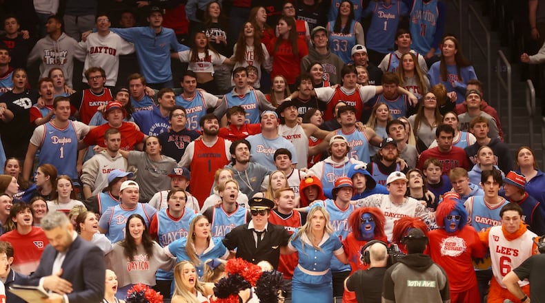 Dayton fans in the Red Scare student section cheer during a game against Davidson on Tuesday, Feb. 4, 2025, at UD Arena.. David Jablonski/Staff
