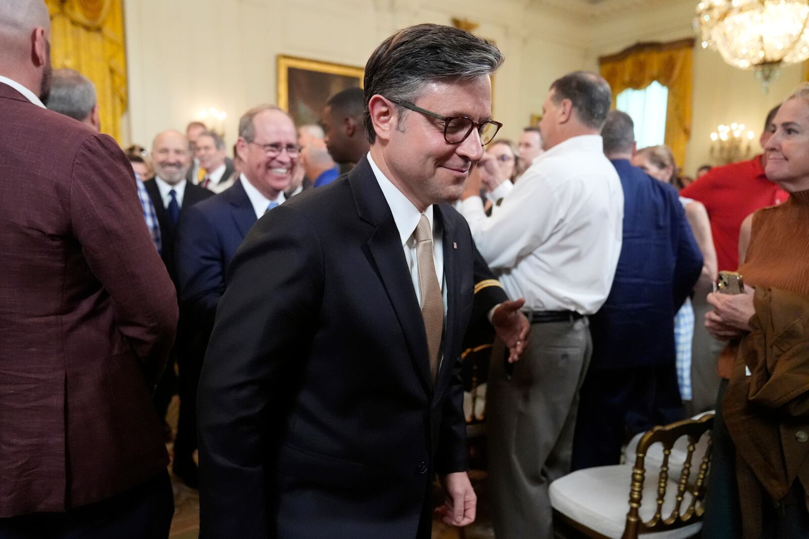 House Speaker Mike Johnson, R-La., departs an event to promote President Donald Trump's domestic policy and budget agenda in the East Room of the White House, Thursday, June 26, 2025, in Washington. (AP Photo/Mark Schiefelbein)