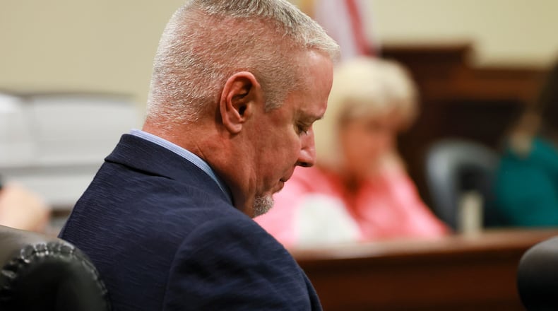 Colin Gray, the father of Apalachee High School shooting suspect Colt Gray, looks down as his attorney gives his opening statement in the courtroom at the Barrow County courthouse, Monday, Feb. 16, 2026, in Winder, Ga. (Jason Getz/Atlanta Journal-Constitution via AP)