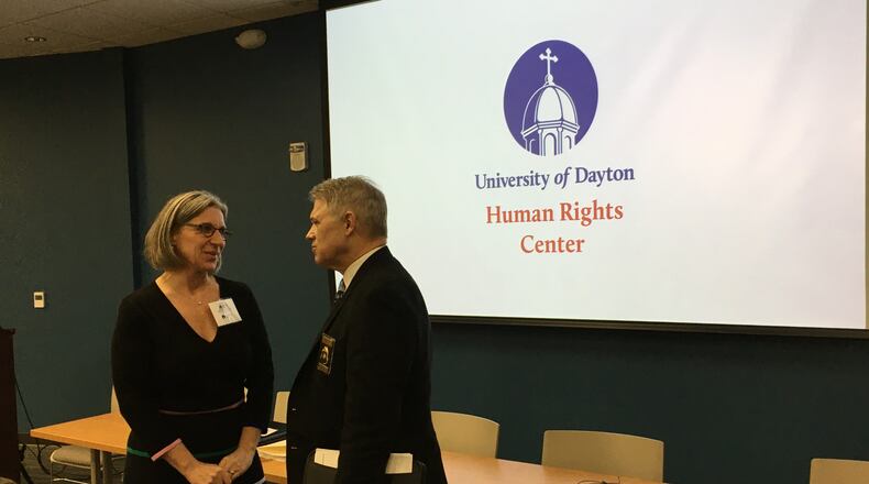 Dayton Police Chief Richard Biehl chats with Jane Keiffer of the Artemis Center at the Universty of Dayton event commemorating the six-month anniversary of the Oregon District shooting. STAFF/BONNIE MEIBERS