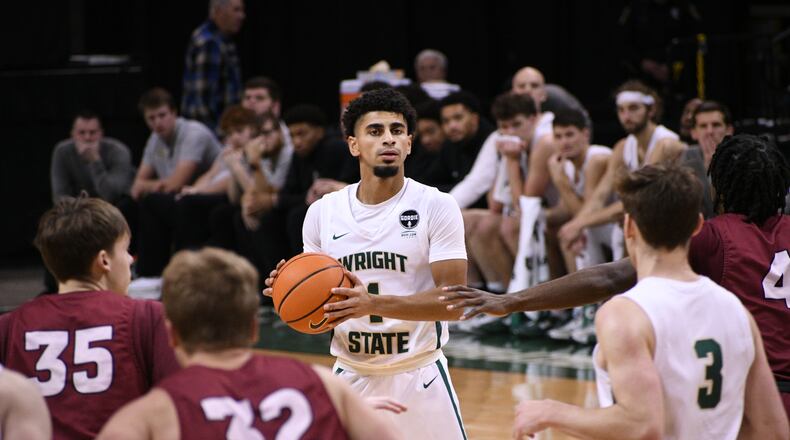 Wright State's Trey Calvin looks over the defense against Northwestern Ohio at the Nutter Center on Dec. 17, 2022. Wright State Athletics photo