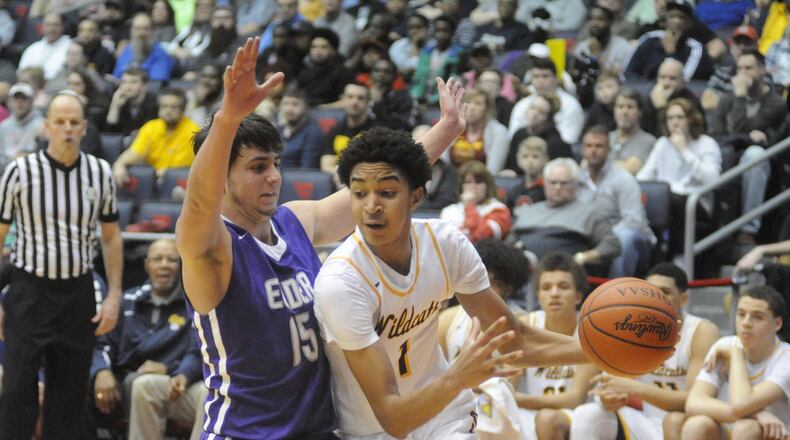 Springfield’s Sam Towns (with ball) hit a free throw to put Springfield up by two with 1:03 left. Springfield defeated Elder 51-45 in a D-I district final at UD Arena on Saturday, March 10, 2018. MARC PENDLETON / STAFF