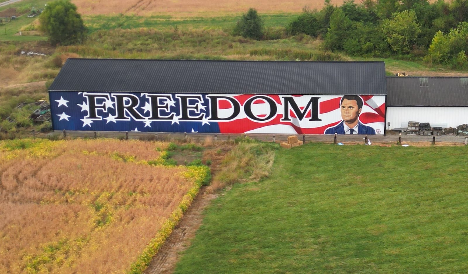 Artist Erica Arndts created a mural in honor of slain activist Charlie Kirk on the side of a barn along Township Line Road near Ohio 73 near Waynesville. NICK GRAHAM/STAFF