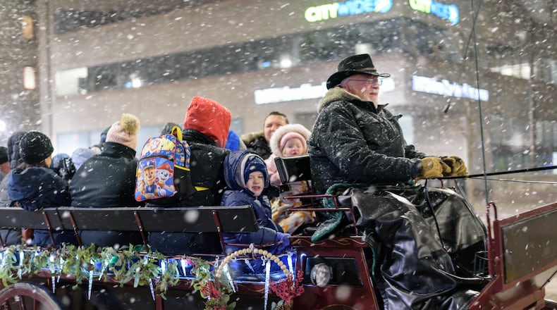 The 52nd annual Dayton Holiday Festival featuring the Grande Illumination and Dayton Children’s Parade Spectacular in Lights, happened in downtown Dayton on Friday, Nov. 29, 2024. TOM GILLIAM / CONTRIBUTING PHOTOGRAPHER