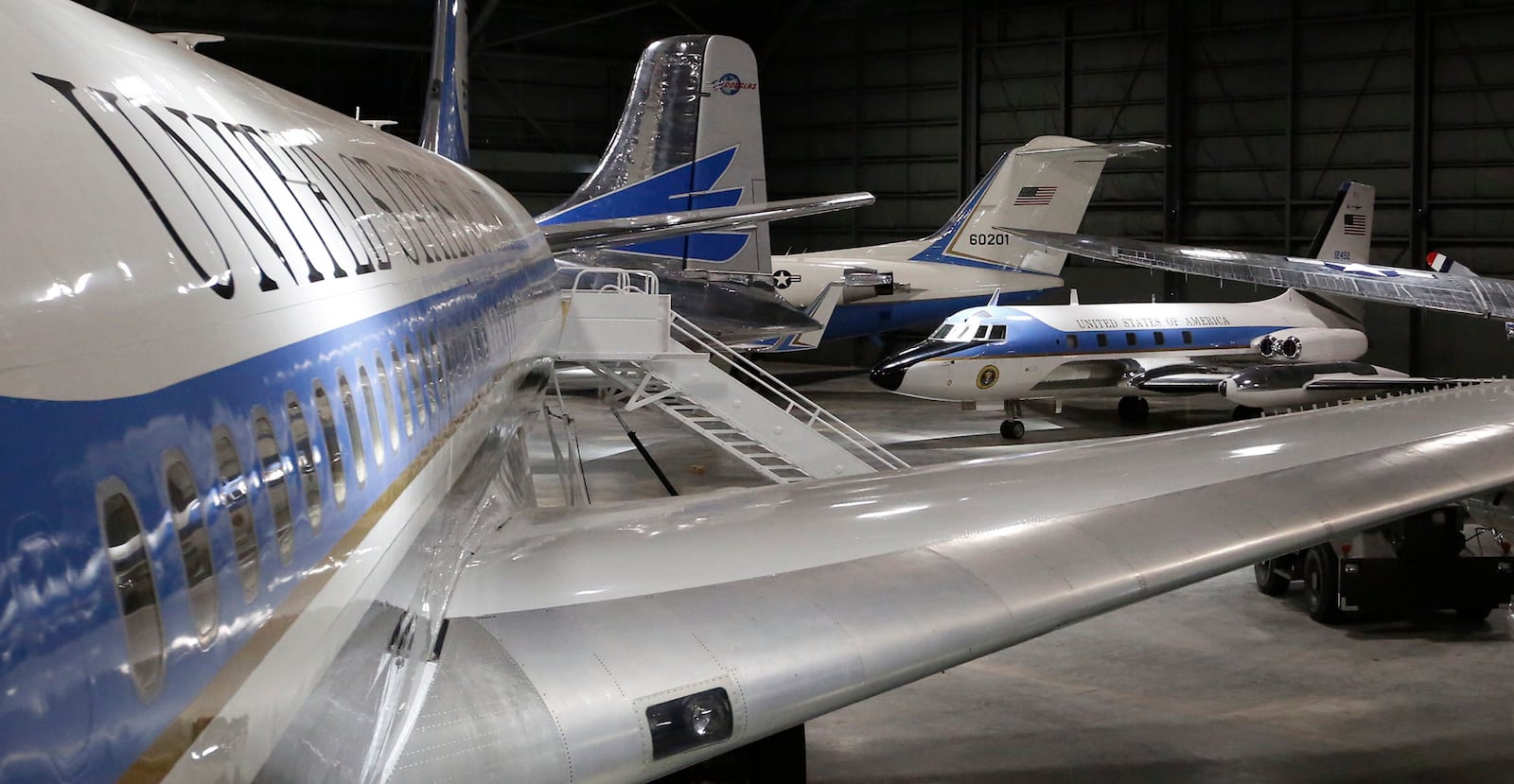 This view down the side of SAM 26000 shows five of ten Presidential aircraft that are now on display in the Air Force Museum's fourth building. TY GREENLEES / STAFF