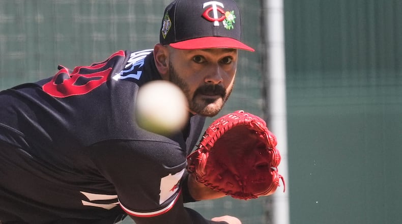Minnesota Twins pitcher Pablo Lopez throws during a spring training baseball workout in Fort Myers, Fla., Monday, Feb. 16, 2026. (AP Photo/Gerald Herbert)
