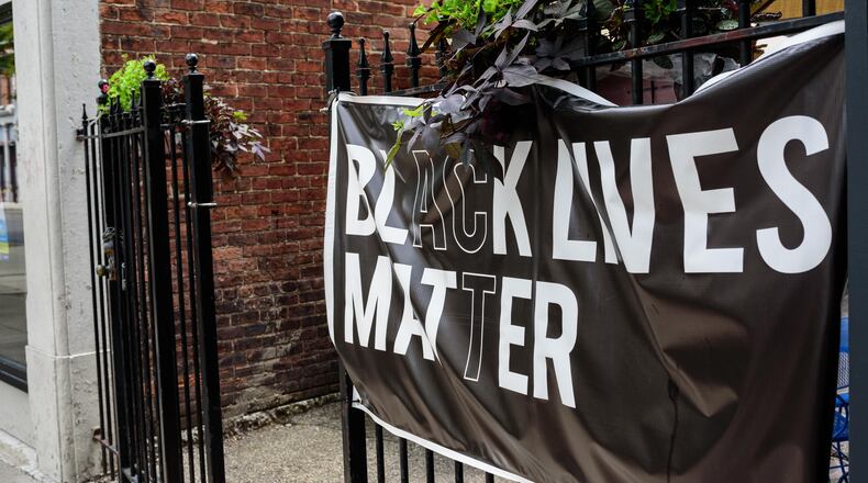 A Black Lives Matter is displayed in Dayton's Oregon District near the patio by 416 Diner on Saturday, Aug. 1, 2020. TOM GILLIAM/CONTRIBUTED