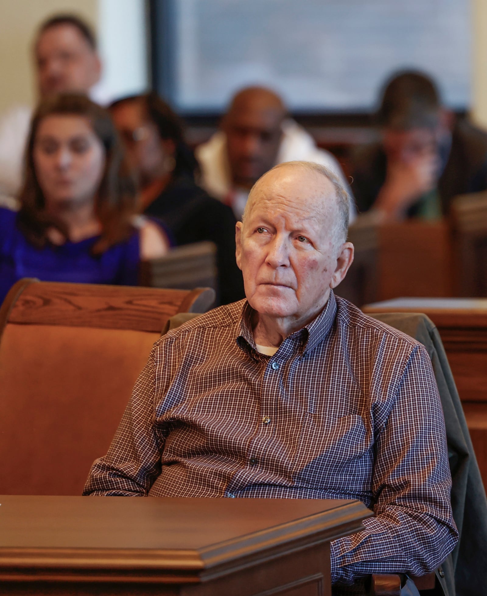 Defendant William Brock listens to opening arguments in his murder trial. The 83-year-old is accused of fatally shooting Lo-Letha ÒLethaÓ Toland-Hall, a 61-year-old Uber driver in March 2024 because he reportedly believed she was trying to rob him after scammers deceived them. JOSEPH COOKE/STAFF