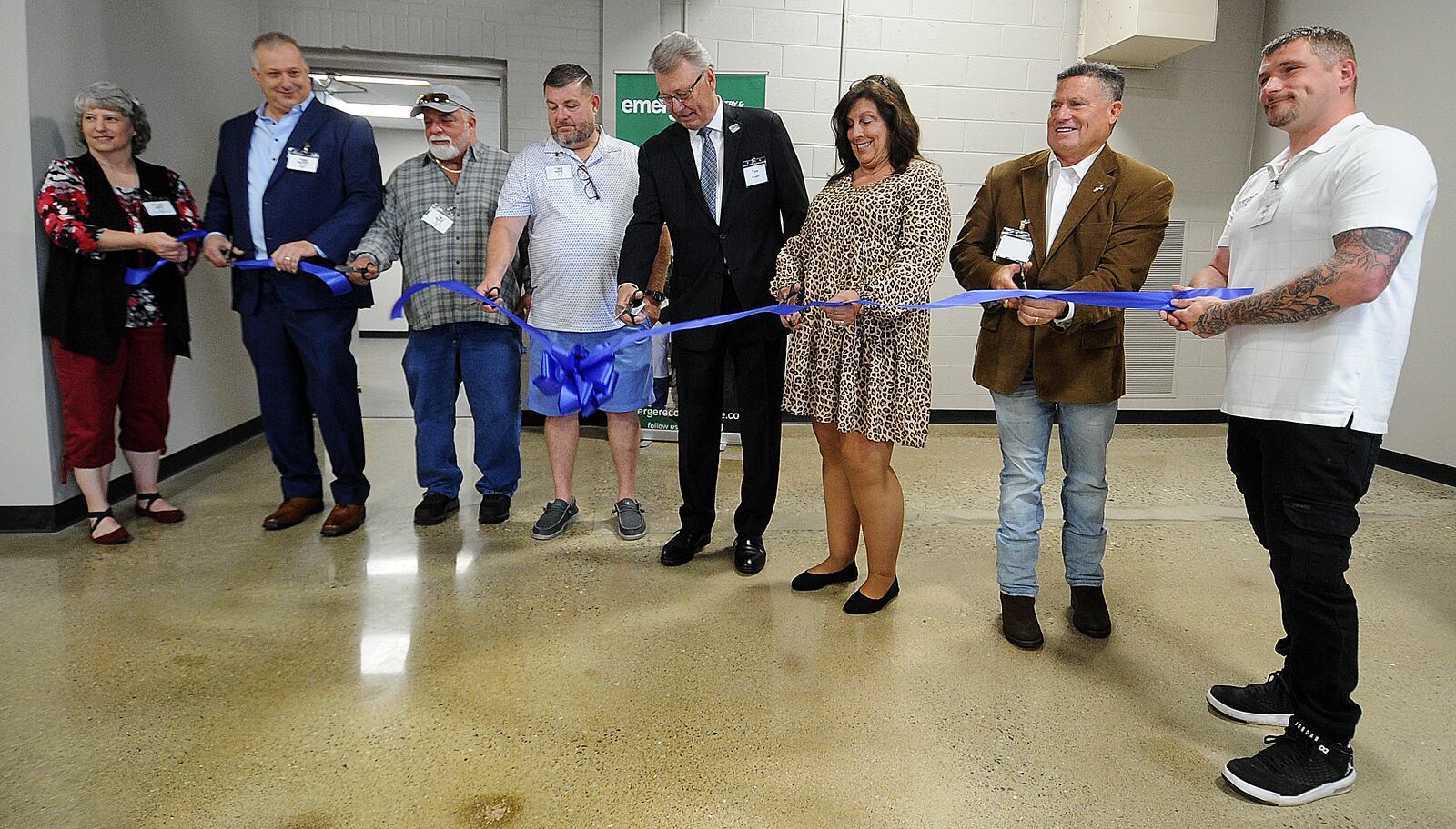 Emerge founders, staff, and local elected officials cut the ribbon on Emerge Recovery and Trade Initiative located at 2960 W. Enon Road, near Xenia, Friday June 16, 2023. MARSHALL GORBY\STAFF