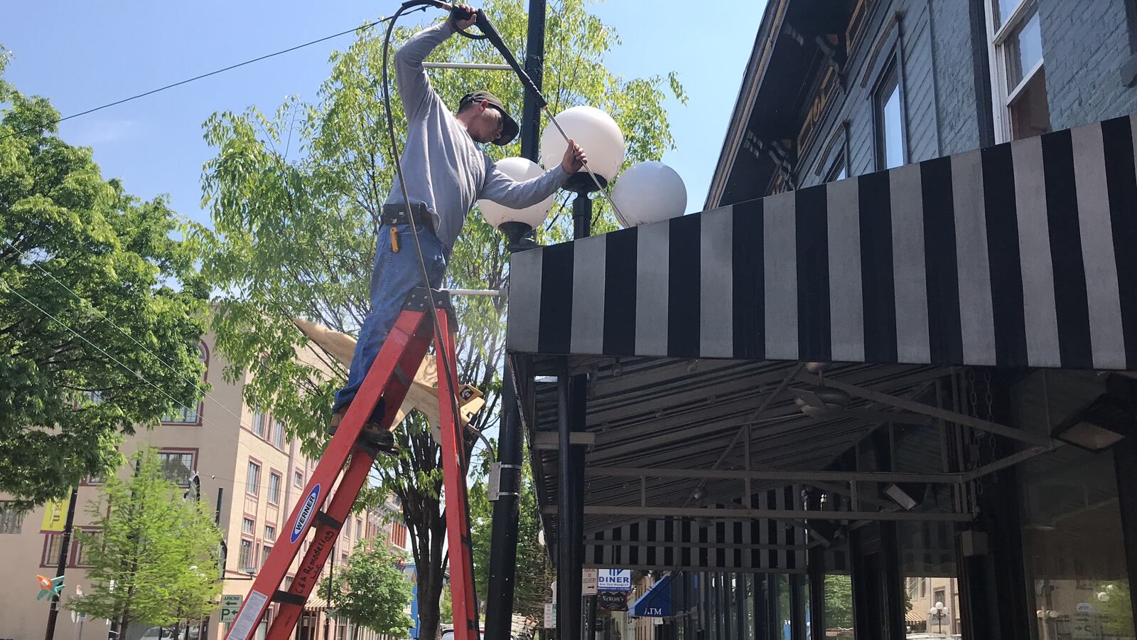 Salar Restaurant and Lounge is being rehabilitated after a fire Dec. 29, 2017. A worker is show doing work on the outside of the restaurant.