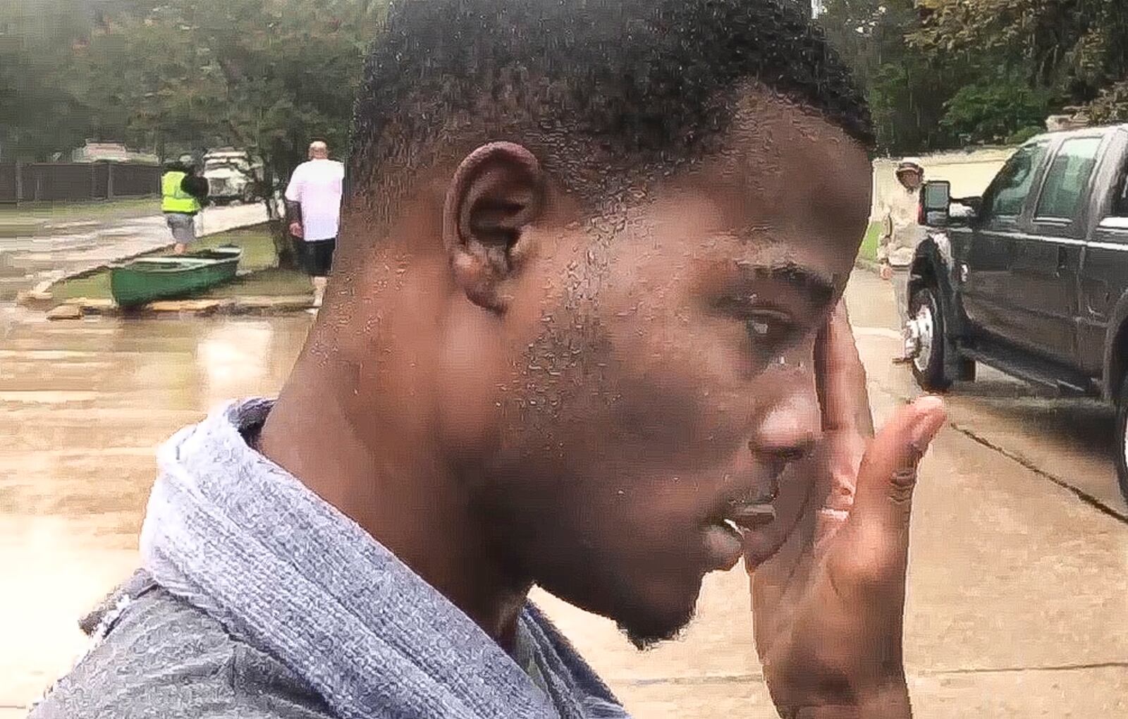 Members of Ohio Task Force 1 brought Ronnie Jones of Houston out of his neighborhood by boat on Tuesday. "They really did a lot for me," Jones said. CHUCK HAMLIN / STAFF