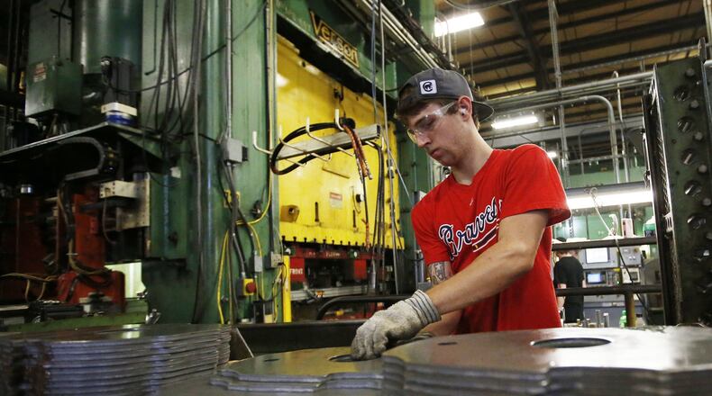 Some local manufacturers say that while the federal tax overhaul has helped their bottom lines, they are feeling the pinch of the trade war with China and are worried about another looming round of tariffs.