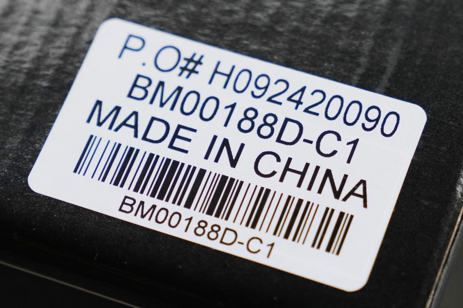 Made in China labels are shown on products in Carmel, Ind., Wednesday, April 9, 2025. (AP Photo/Michael Conroy)