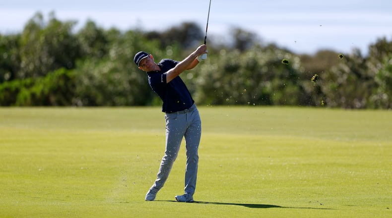 Justin Rose, of England, hits from the 17th fairway while playing the South Course at Torrey Pines during the second round of the Farmers Insurance Open golf tournament Friday, Jan. 30, 2026, in San Diego. (AP Photo/Caroline Brehman)
