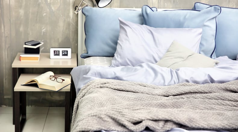 When considering the bedside table, Dallas designer Emily Johnston Larkin says form and function are equally important. (Dreamstime)