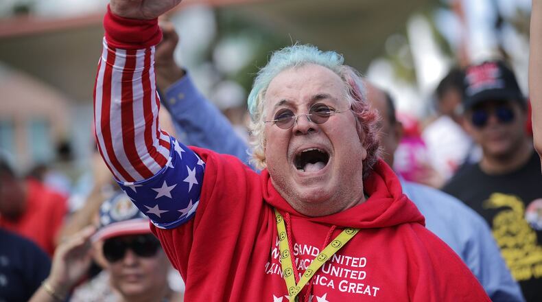 Supporters of Republican presidential nominee Donald Trump cheer during a campaign rally at Bayfront Park Amphitheater November 2, 2016 in Miami, Florida. With just days before Election Day in the United States, Trump and his opponent, Democratic presidential nominee Hillary Clinton, are campaigning in key battleground states that each must win to take the White House. (Photo by Chip Somodevilla/Getty Images)