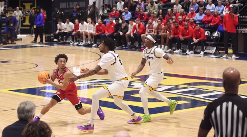 Dayton's Javon Bennett looks to make a pass against La Salle on Wednesday, Jan. 21, 2026, at John E. Glaser Arena in Philadelphia. David Jablonski/Staff