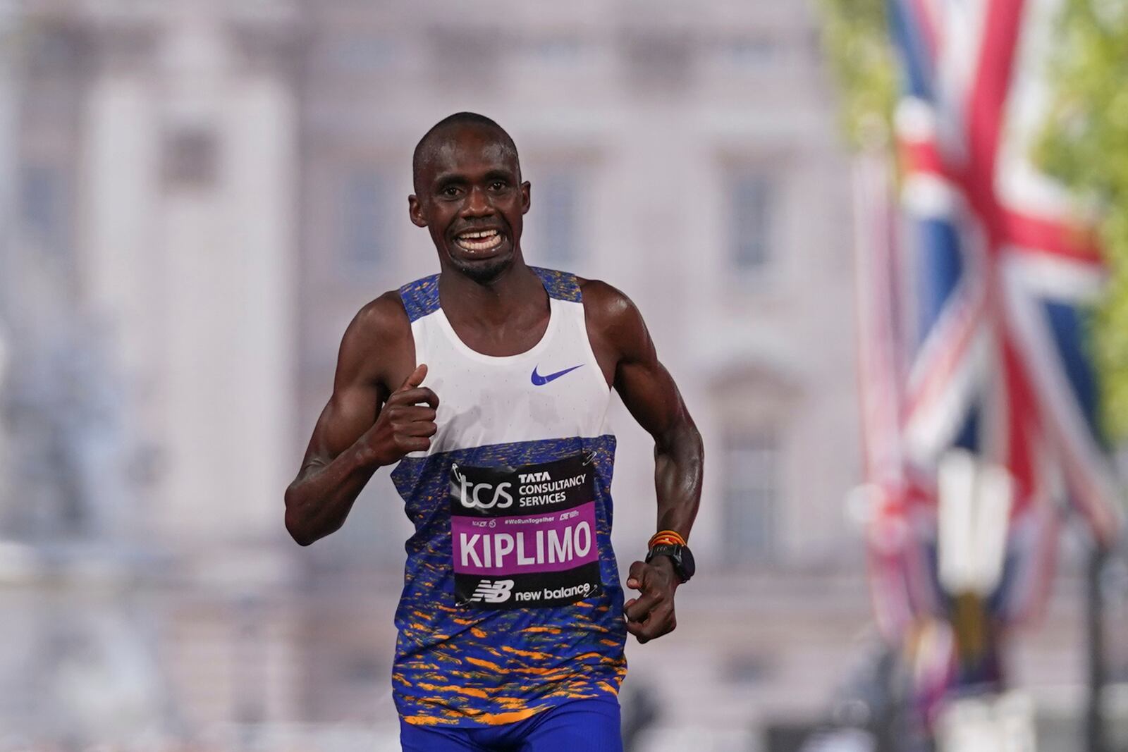 Jacob Kiplimo of Uganda, crosses the line to place second in the men's race at the London Marathon, Sunday, April 27, 2025. (AP Photo/Alberto Pezzali)