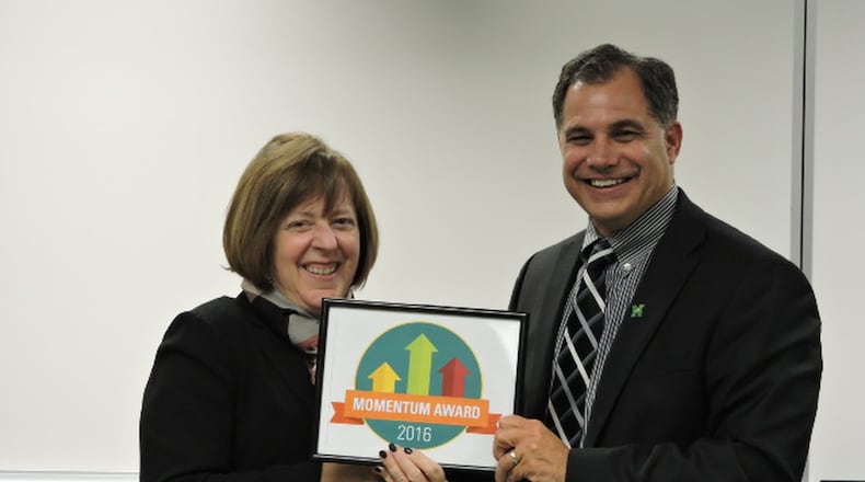 Northmont is one of three districts in Montgomery County to receive the Momentum Award, presented by the State Board of Education recognizing schools for exceeding expectations in student growth for the year. Schools must earn straight As on all Value-Added measures on the report card. The school or district must have at least two Value-Added subgroups of students, which includes gifted, lowest 20 percent in achievement, and students with disabilities. Pictured are Board President Linda Blum and Superintendent Tony Thomas.