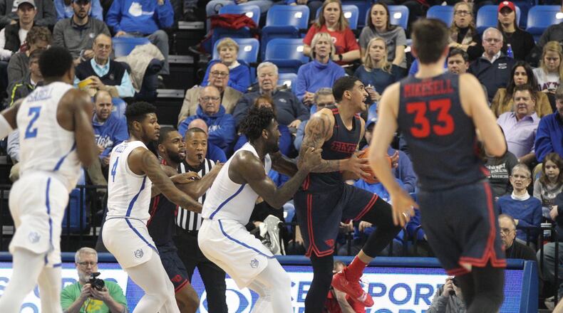 Saint Louis forward D.J. Foreman is called for an intentional foul after grabbing Dayton’s Obi Toppin in the first half on Tuesday, Feb. 5, 2019, at Chaifetz Arena in St. Louis. David Jablonski/Staff