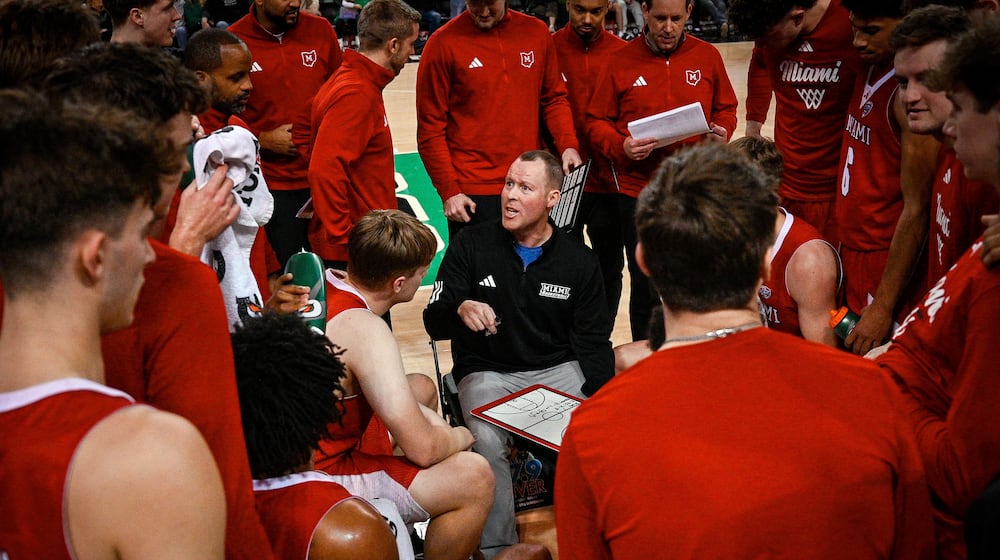 Miami (Ohio) Head Coach Travis Steele talks to his team during the second half of an NCAA college Basketball game against Marshall, Saturday, Feb. 7, 2026, in Huntington, W.Va. (AP Photo/Tyler Evert)
