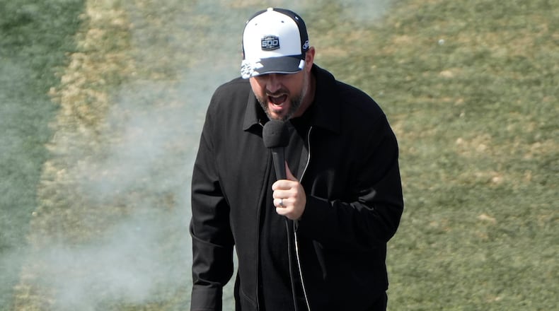 Comedian Nate Bargatze announce the start of the race during the NASCAR Daytona 500 auto race at Daytona International Speedway, Sunday, Feb. 15, 2026, in Daytona Beach, Fla. (AP Photo/John Raoux)
