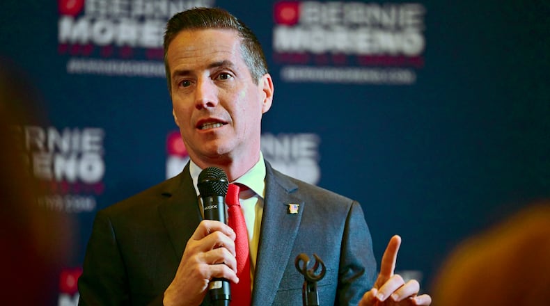 FILE - Cleveland businessman Bernie Moreno, a Republican candidate for U.S. Senate, speaks to supporters during his primary election night watch party in Westlake, Ohio, March 19, 2024. Moreno likes to portray himself as a political outsider in his race against Democratic Sen. Sherrod Brown. But while his personal backstory may only be emerging in his home state, his close-knit family's wealth and influence are well-documented elsewhere. (AP Photo/David Dermer, File)