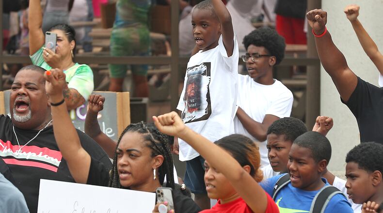 Family and friends of Eric Cole held a demonstration in downtown Springfield in June 2021 to voice their feelings about the circumstances surrounding Cole's death. Eric Cole was a shooting victim who was run over and killed by a responding Springfield Police Officer while he was in the street. Protesters marched from City Hall to the Springfield Police Station where some of them laid in the street. They then marched to the Clark County Courthouse where they demanded answers. BILL LACKEY/STAFF