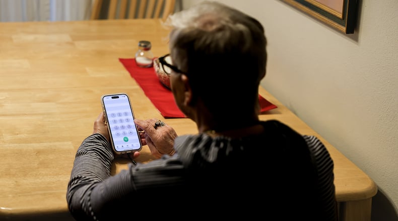 A Dayton area woman lost over $50,000 to scammers and is telling her story to warn others. BRYANT BILLING / STAFF