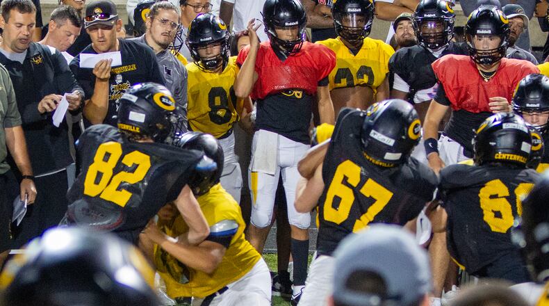 The tradition of Midnight Hits at Centerville High School was revived in 2002 and signals the start of the day of practice when full contact begins. Jeff Gilbert/CONTRIBUTED