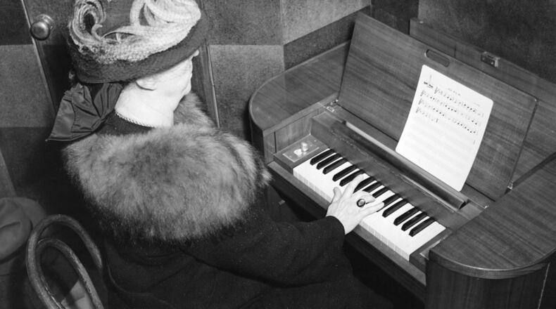 Edith Deeds playing the Deeds Carillon organ. CONTRIBUTED PHOTO, DAYTON HISTORY