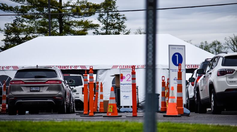 Cars line up for COVID-19 testing Tuesday, May 5, 2020 at Fort Hamilton Hospital in Hamilton. NICK GRAHAM / STAFF