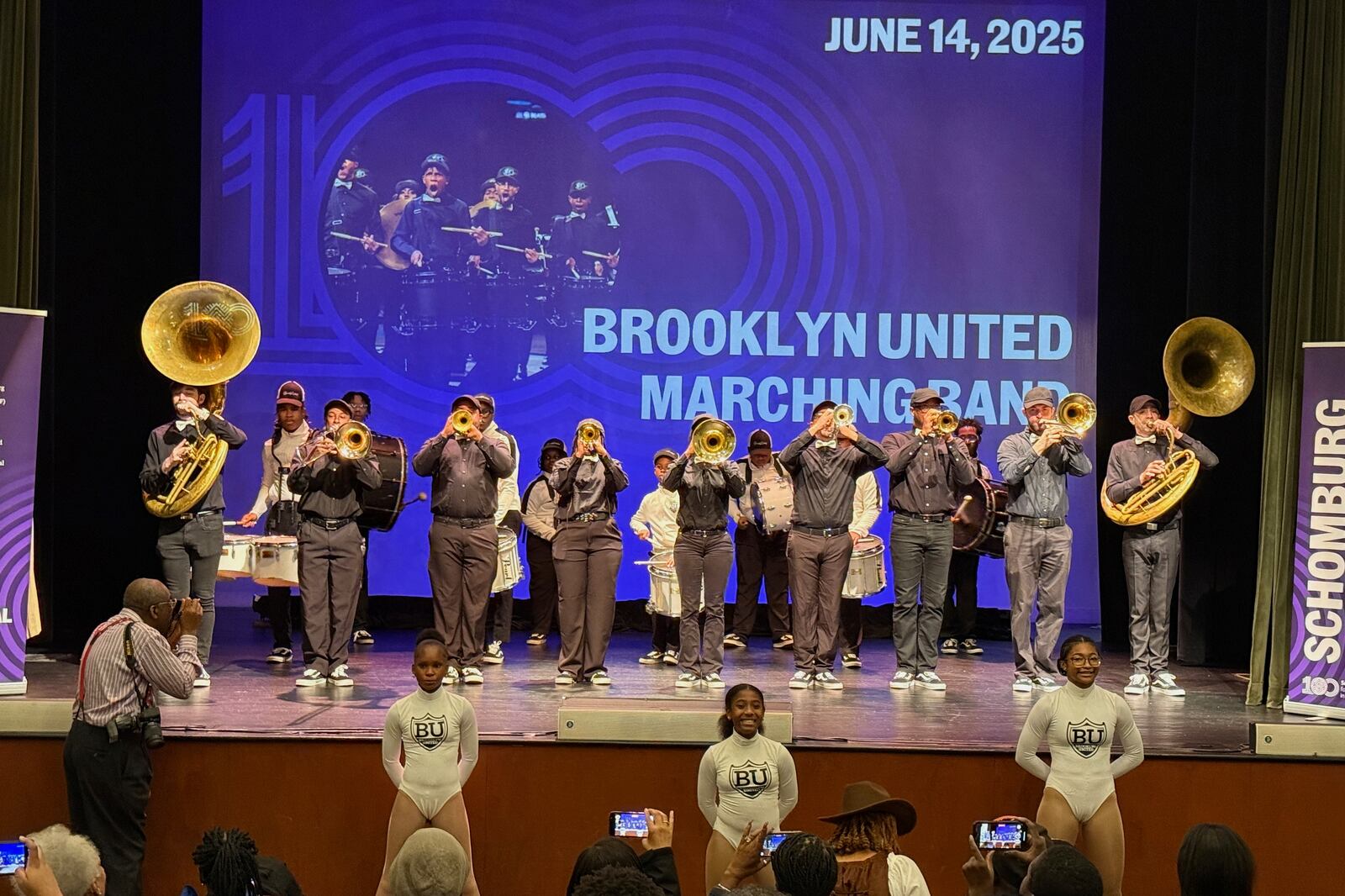 Brooklyn United Marching Band performs in the Langston Hughes Auditorium celebrating the centennial of the Schomburg Center for Research in Black Culture in New York, on Saturday, June 14, 2025. (AP Photo/Jaylen Green)