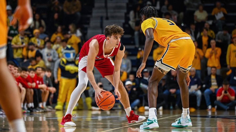 Miami’s Luke Skaljac surveys the court during his game against Toledo on Friday night at Savage Arena. MIAMI ATHLETICS / CONTRIBUTED PHOTO