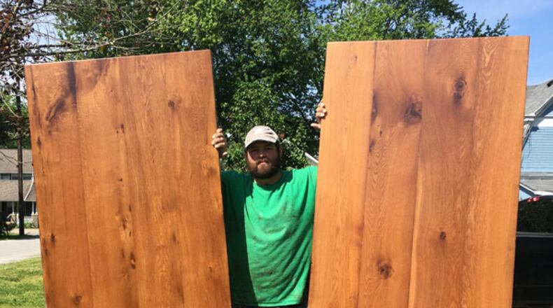 Cedarville alumnus from the class of 2013 Phil Kochsmeier works on the tables he was contracted to build for the university's new Chick-fil-A restaurant.