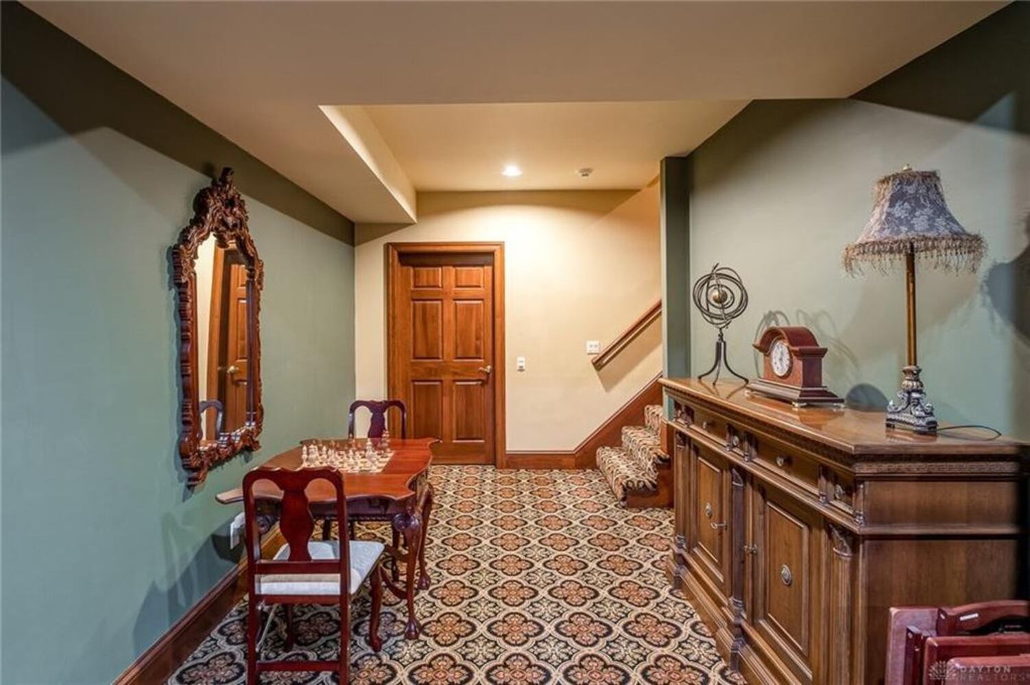 French country-style home offers grand social areas
