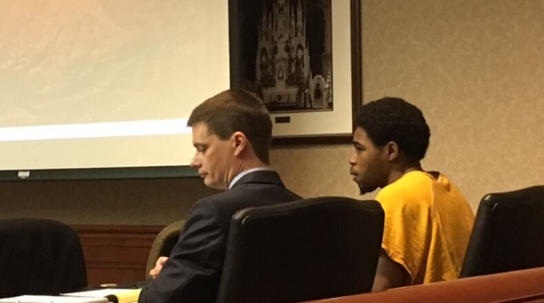 Gonnii White, 17, charged with murder in the shooting death of another teen in May, in court Monday with attorney Tim Upton for a motion to suppress statements he made to detectives. LAUREN PACK/STAFF