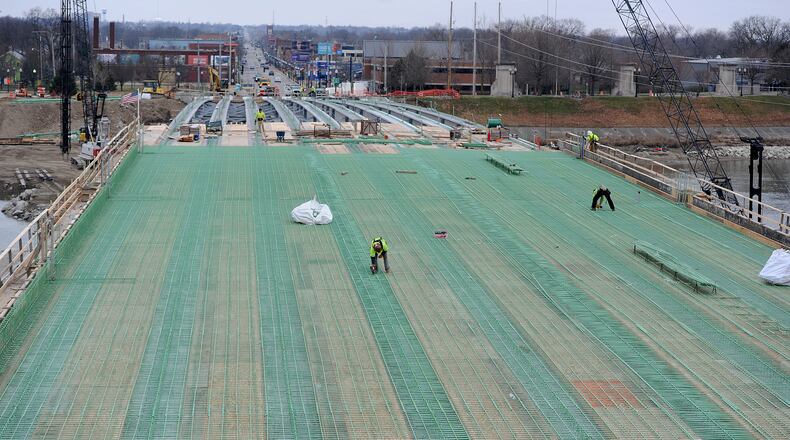 Work continues on the Third Street bridge Monday, Dec. 14, 2020. The new bridge will be widened from four to five lanes and offer 10-feet-wide sidewalks on the north side and 17-feet-wide paths on the other side. MARSHALL GORBY\STAFF