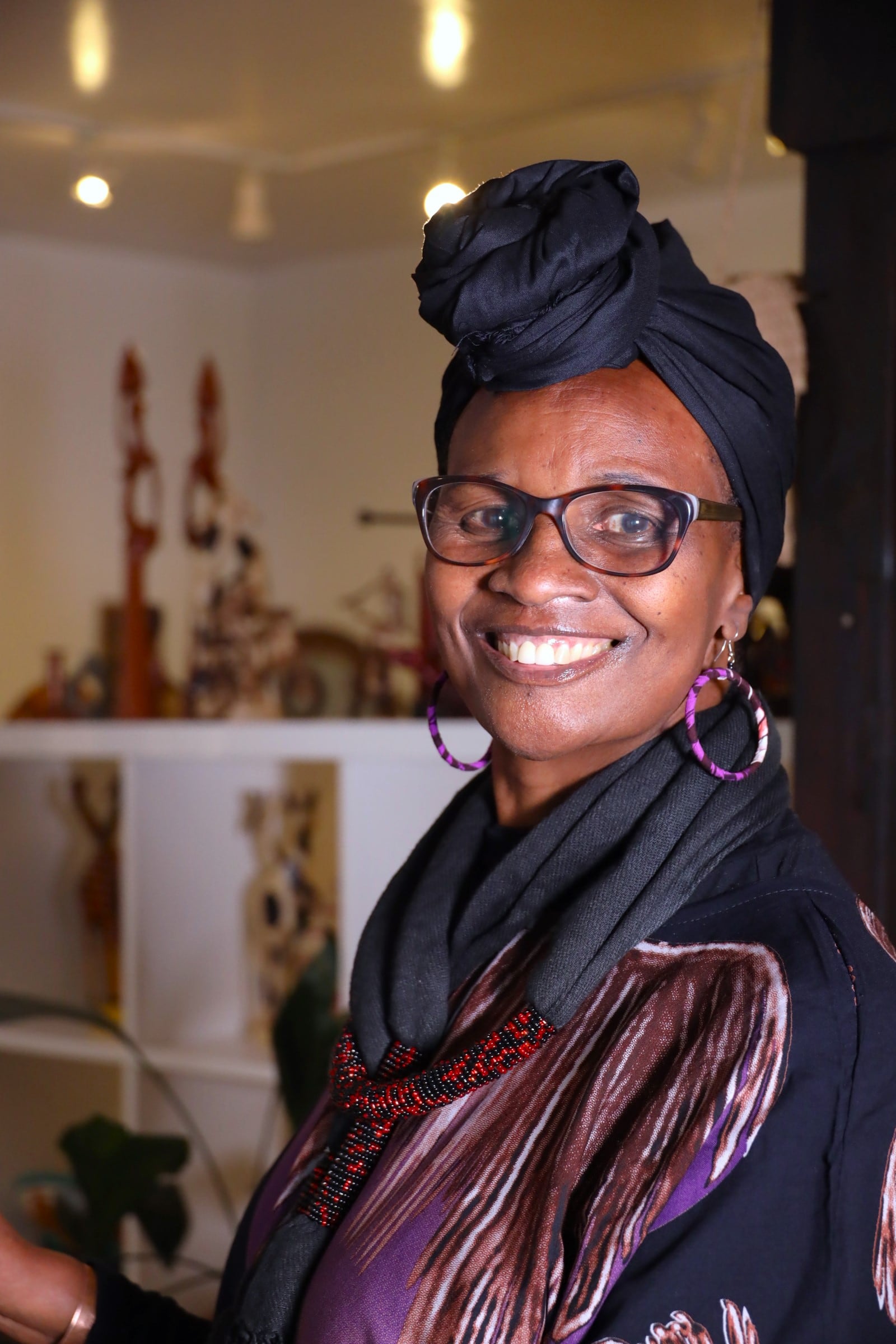 Severa Mwiza's portrait was taken at her shop. CONTRIBUTED