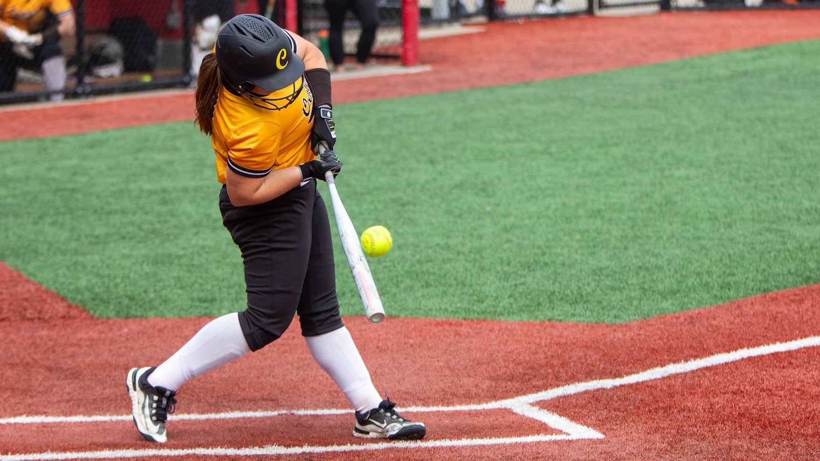Caitlyn Belcher hits the second of her two-run doubles that put Centerville up 8-3 in the sixth inning of Saturday's state semifinal win over Massillon Jackson in Akron. Jeff Gilbert/CONTRIBUTED
