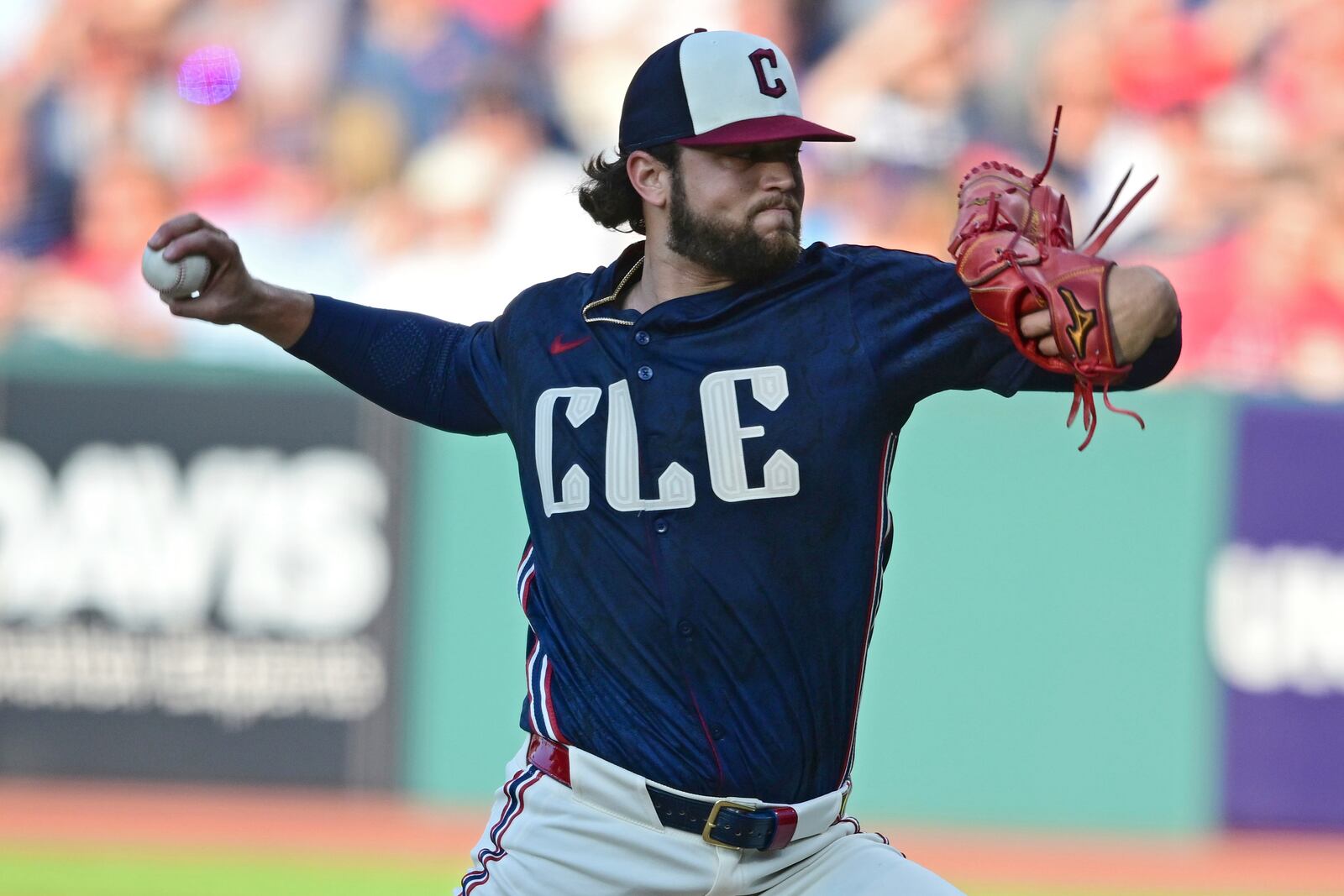 Cleveland Guardians starting pitcher Slade Cecconi throws during a baseball game against the Athletics, Friday, July 18, 2025, in Cleveland. (AP Photo/David Dermer)