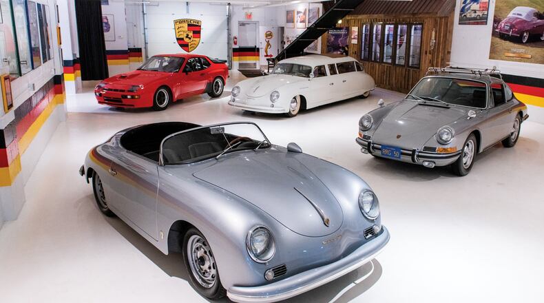 Cars and other collectibles once owned by avid collector John Dixon will be up for auction at the Taj Ma Garaj, 300 S. Perry St., Dayton. In the foreground is a 1957 Porsche 356 A Carrera GT Speedster Coachwork by Reutter that is expected to bring between $1.5 to $2 million. Photo by Darin Schnabel 2019 Courtesy of RM Sotheby’s