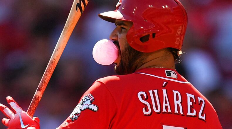 Eugenio Suarez #7 of the Cincinnati Reds blows a bubble while batting in the first inning against the Pittsburgh Pirates at Great American Ball Park on September 30, 2018, in Cincinnati, Ohio. (Photo by Jamie Sabau/Getty Images)