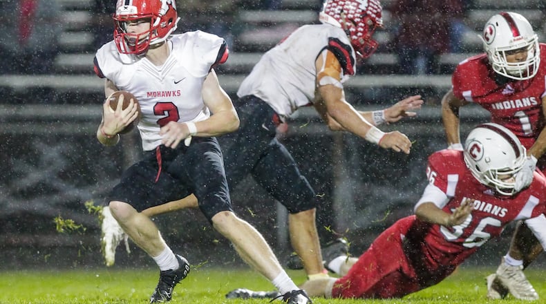 Connor Blaylock of Middletown Madison (with ball) was All-Ohio first team as a defensive back. NICK GRAHAM/STAFF