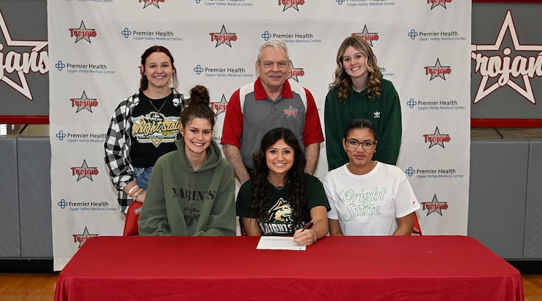 Greater Dayton USBC Hall of Fame inductee Rob Dever (pictured at Trojans bowler Aiyana Godwin's Wright State University signing) has been the Troy bowling coach for more than two decades - CONTRIBUTED