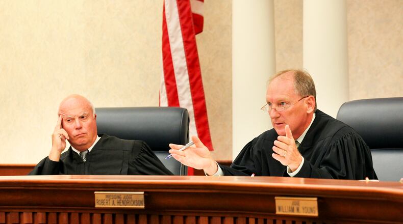 12th District Court of Appeals Judges Robert Ringland (left) and Robert Hendrickson listen to oral arguments during a second appeal attempt in the Ryan Widmer case at the 12th District Court of Appeals in Middletown Tuesday, Aug. 28, 2012. Ryan Widmer was convicted last year for drowning his wife Sarah in the bathtub of their Warren County home. If he is successful there will be a fourth trial.