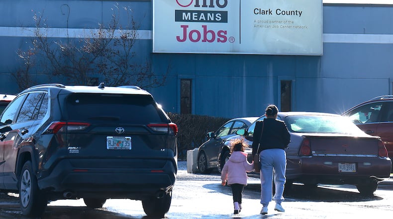 People enter the Clark County Department of Job and Family Services Thursday, Dec. 12, 2024. BILL LACKEY/STAFF